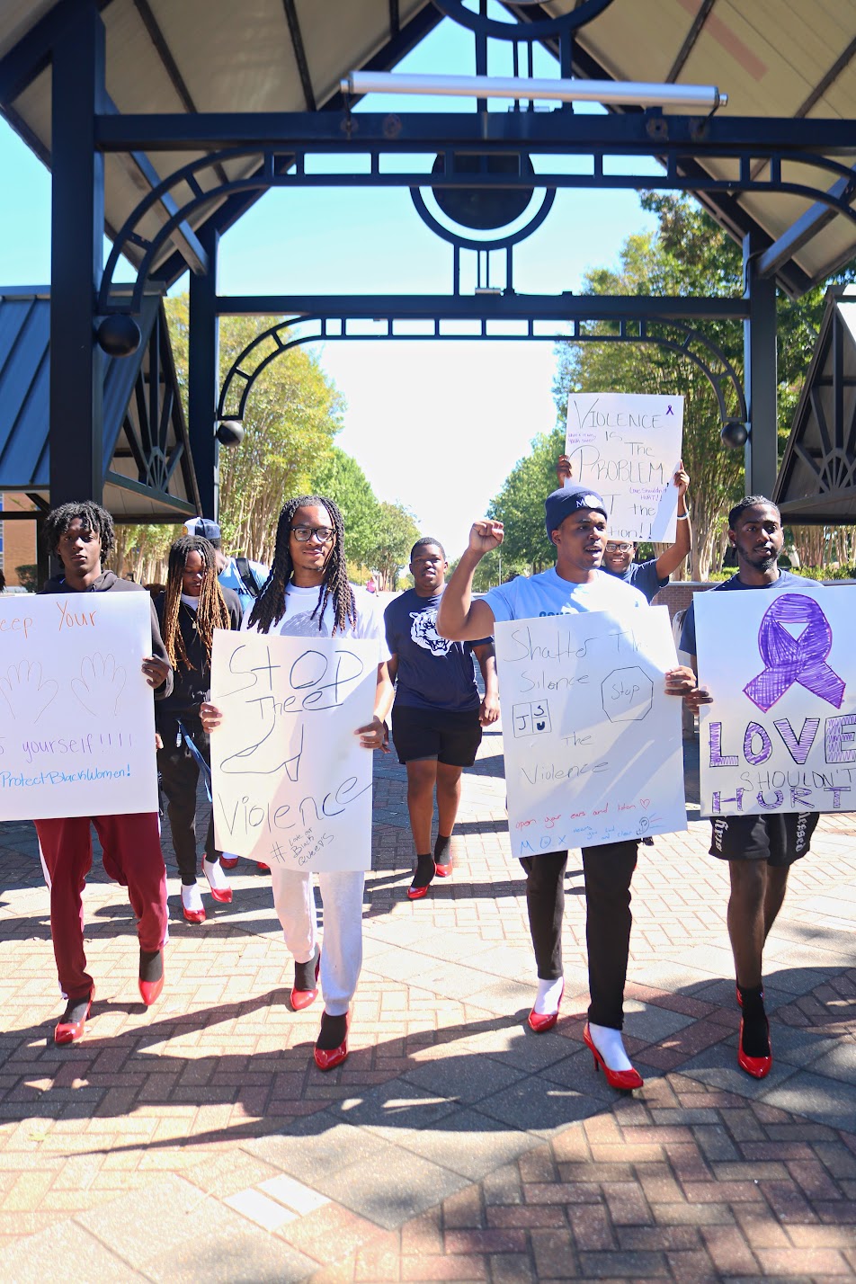 xMen of Excellence (MOX) host Walk a Mile In Her Shoes Domestic Violence Awareness event
